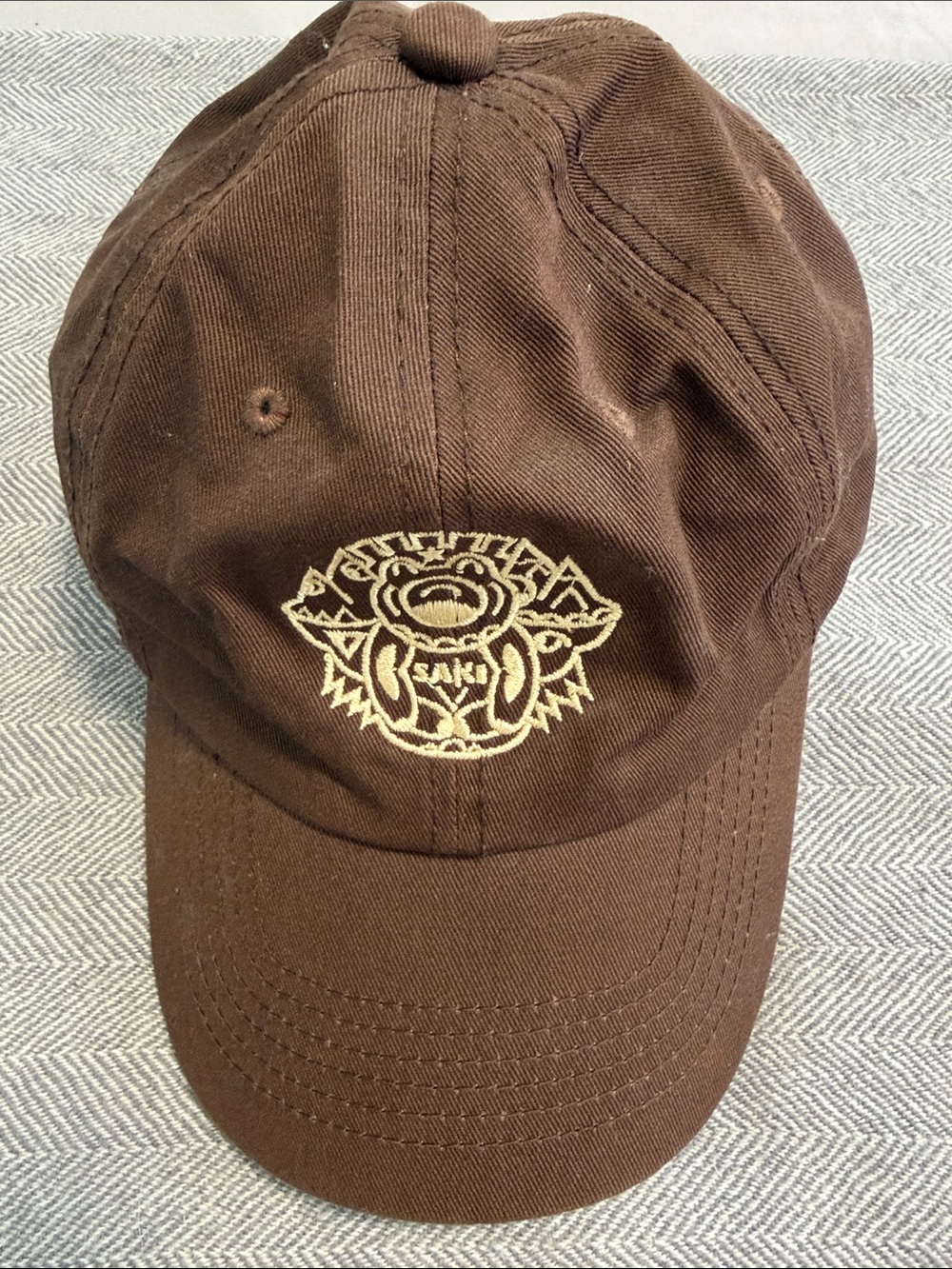 The Sak Brown Embroidered Logo Baseball Cap